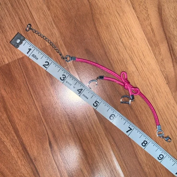 Authentic Christian Dior Leather and Metal Charm Bow Bracelet - Picture 6 of 11